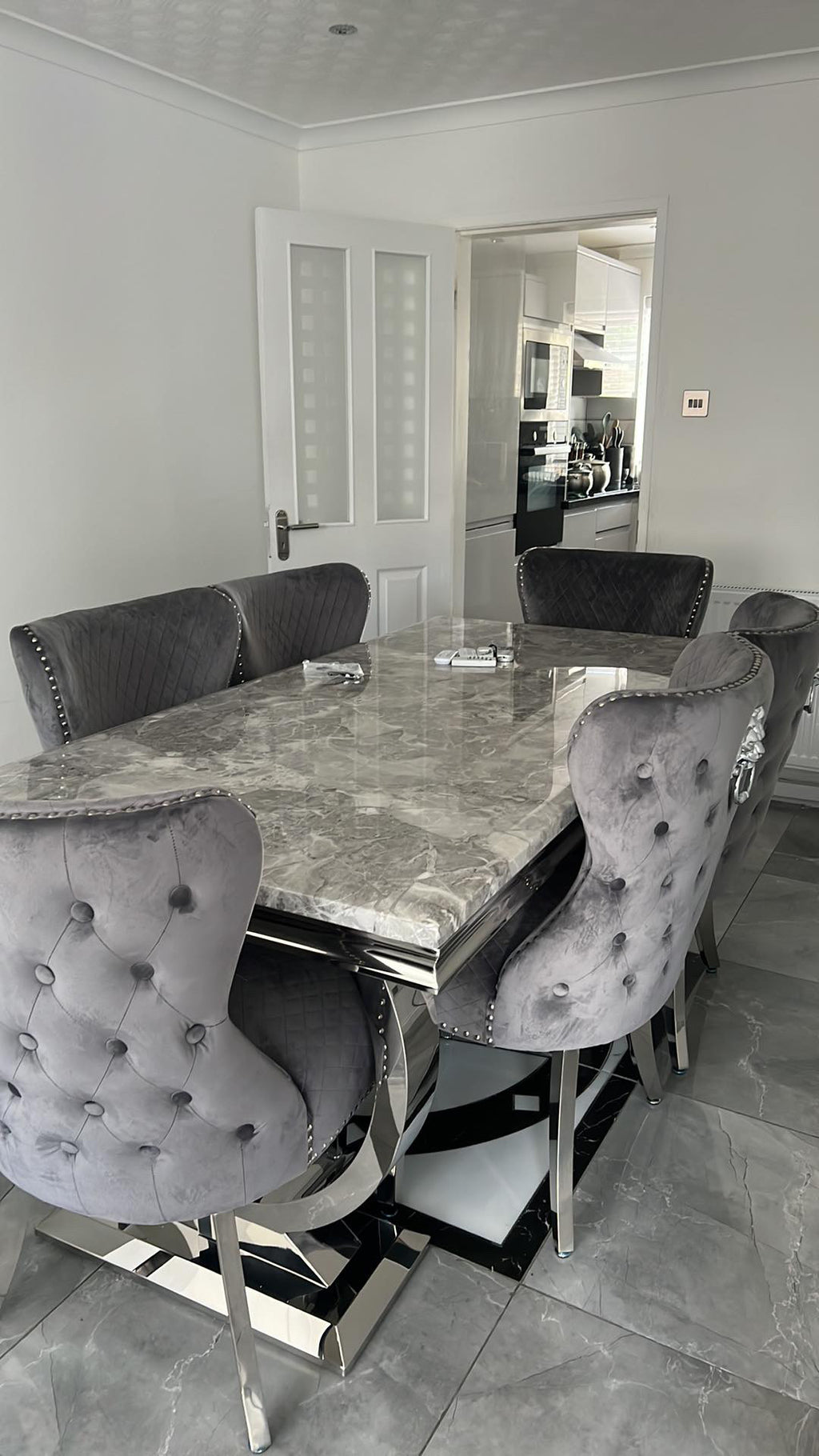 Arianna Marble Dining Table With Lewis Lion Knocker Velvet Chairs