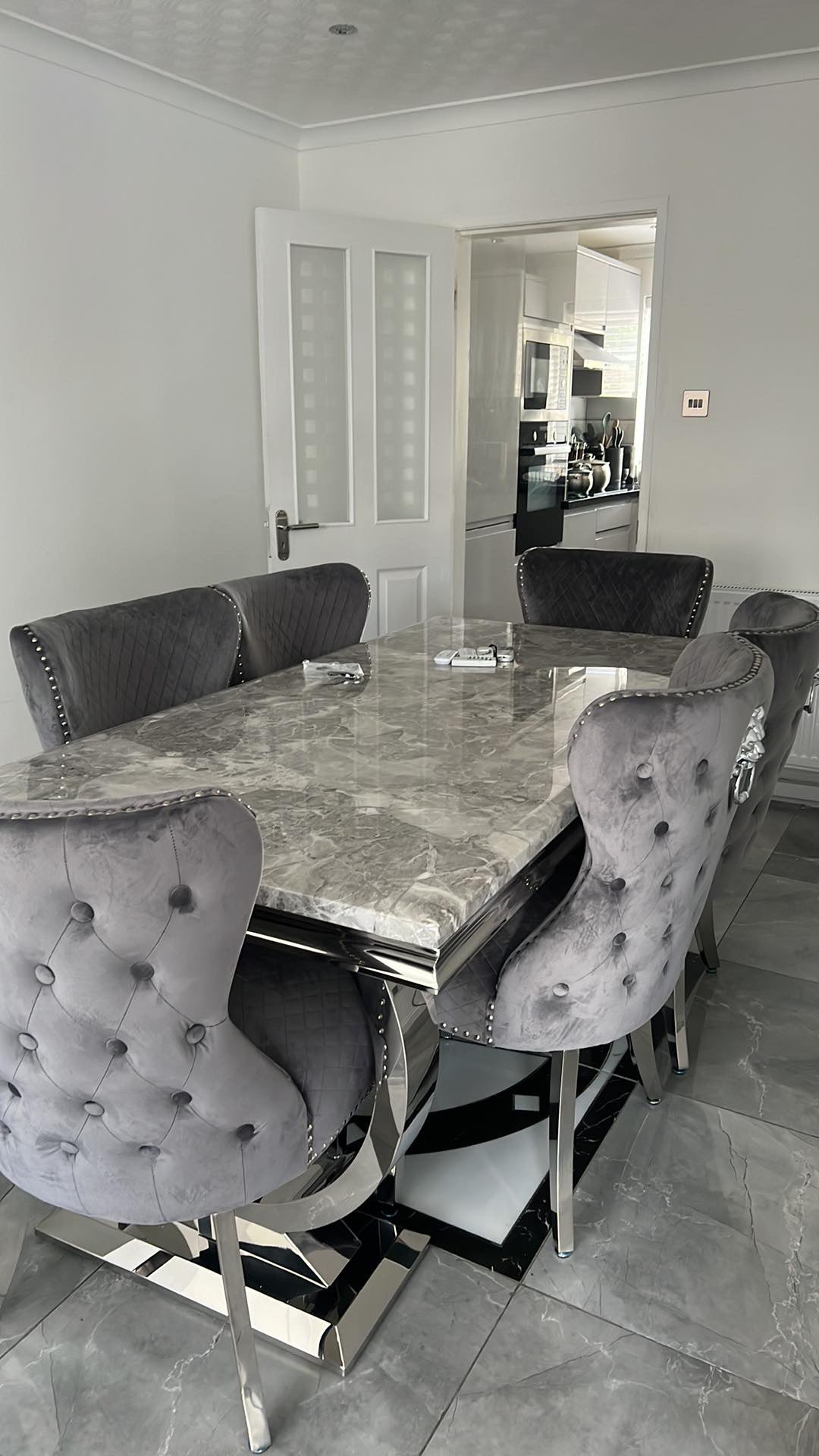 Arianna Marble Dining Table With Lewis Lion Knocker Velvet Chairs