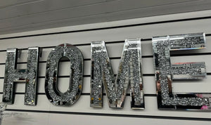 Mirrored HOME letters