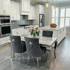 Vienna Marble Dining Table With Bently Knocker Chairs lion